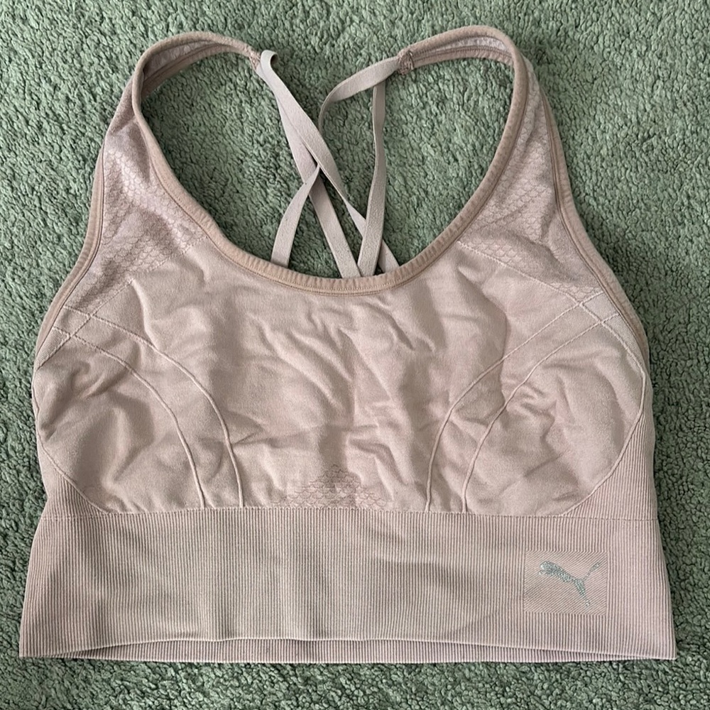 Puma Pink Sports Bra with Crossed Straps and Seamless Design